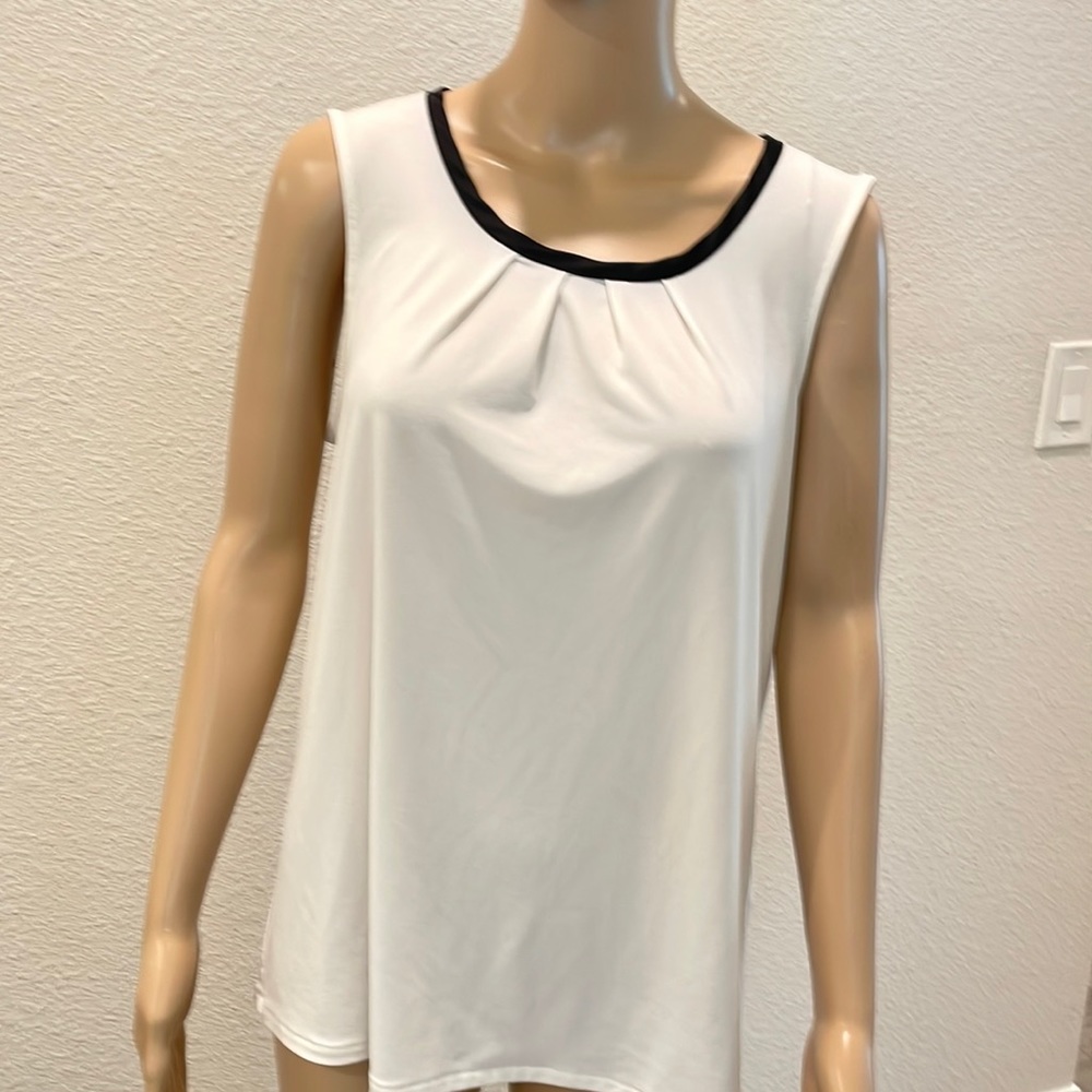 Banana republic off white  sleeveless blouse with black trim size medium
